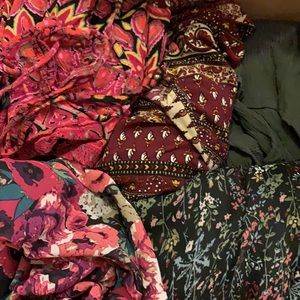 Box of women’s dresses/rompers size small